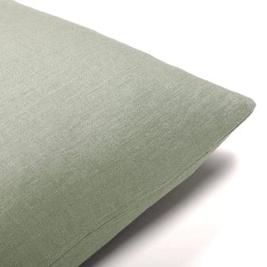 Upper corner of the Colleen pillow cover on a white background.