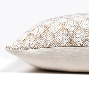 Side view of Jade lumbar pillow cover showing the solid ivory backing.