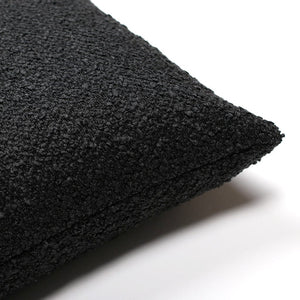 Corner of the black Onyx pillow cover from Colin + Finn