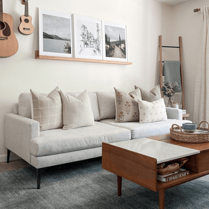 Eden pillow combination from Colin and Finn on white sofa in mid-century living room.