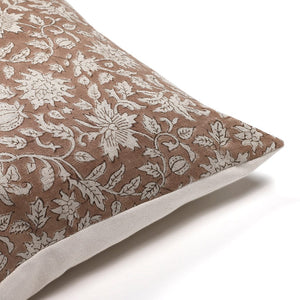 Upper corner of Eleanor natural pillow cover from Colin and Finn on a white background.