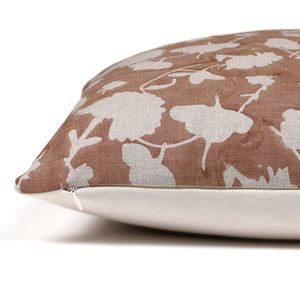Side view of Colin and Finn's Florence pillow cover showing the invisible zipper separating the blush floral motif on the front and solid ivory backing on the back.