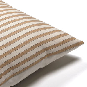 Corner of Leo pillow cover from Colin and Finn showing tan stripe details with ivory backing
