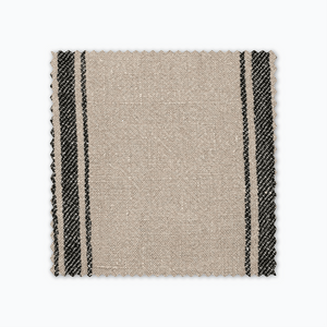 Maverick fabric swatch from Colin and Finn. Black stripes on a tan background.