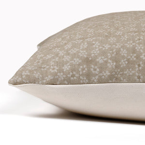 Neville pillow cover in sand showing invisible zipper separating the sand and linen floral front from the solid ivory backing.