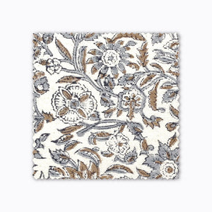 Penelope fabric swatch from Colin and Finn. A blue and brown floral hand-block textile on white handwoven linen