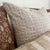 Closeup detail of the Esme pillow cover, showing the intricate detailing of the slub patterning.