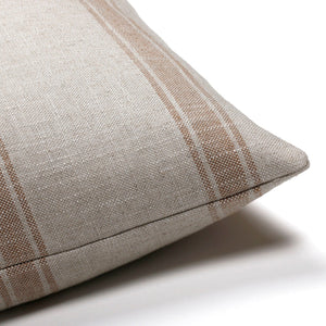 Upper corner view of Arizona pillow cover that's a muted gray and muted rust stripes.