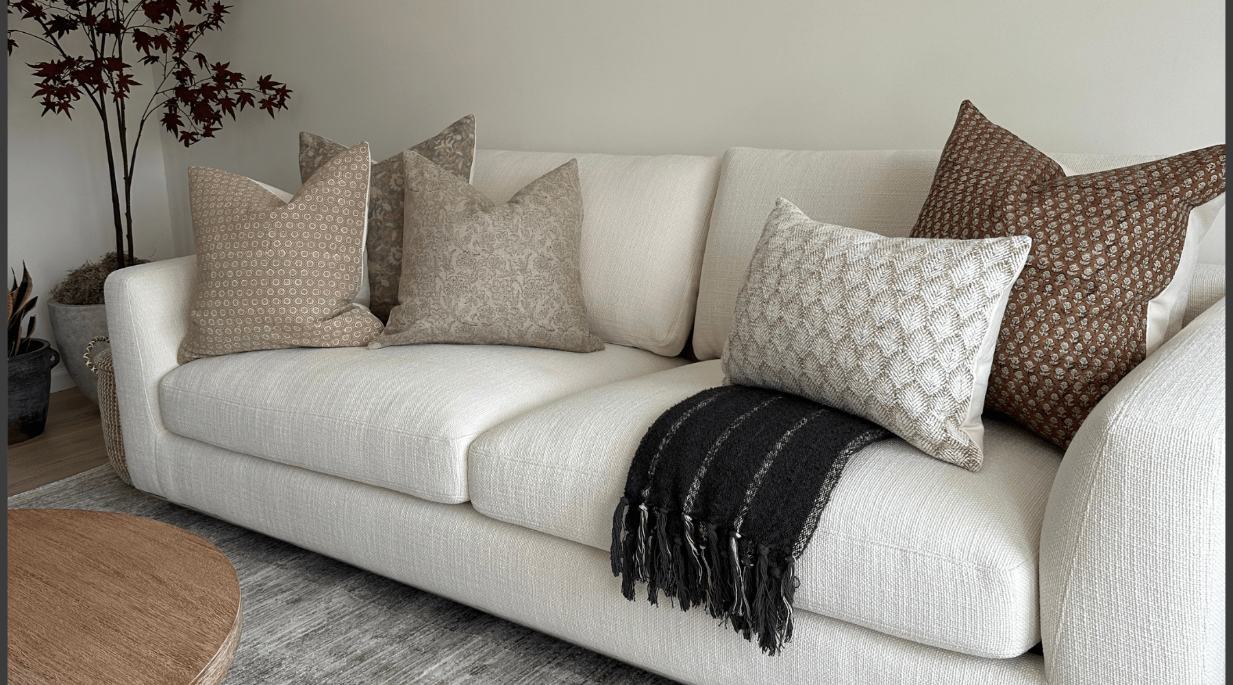 Matilda, Kennedy, Fitz, Emery, and Jade lumbar pillow covers from Colin and Finn on cream sofa from @havrillahome