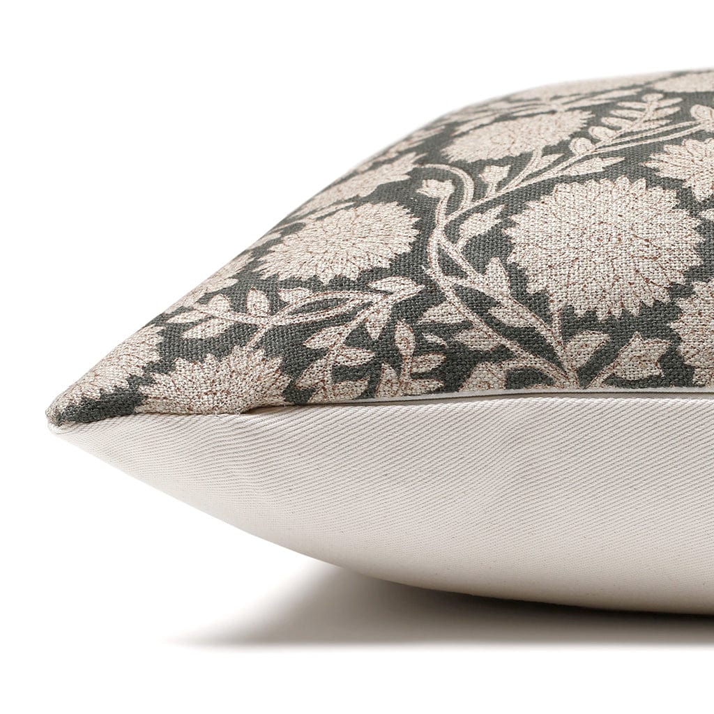 Side view of Callum pillow cover showing floral block printed front and solid, ivory backing.