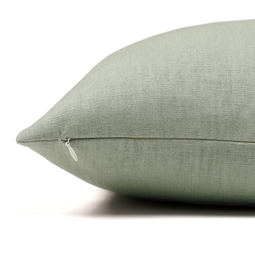 Side view of the Colleen pillow cover showing the textile as the same on the front and back and the invisible zipper.