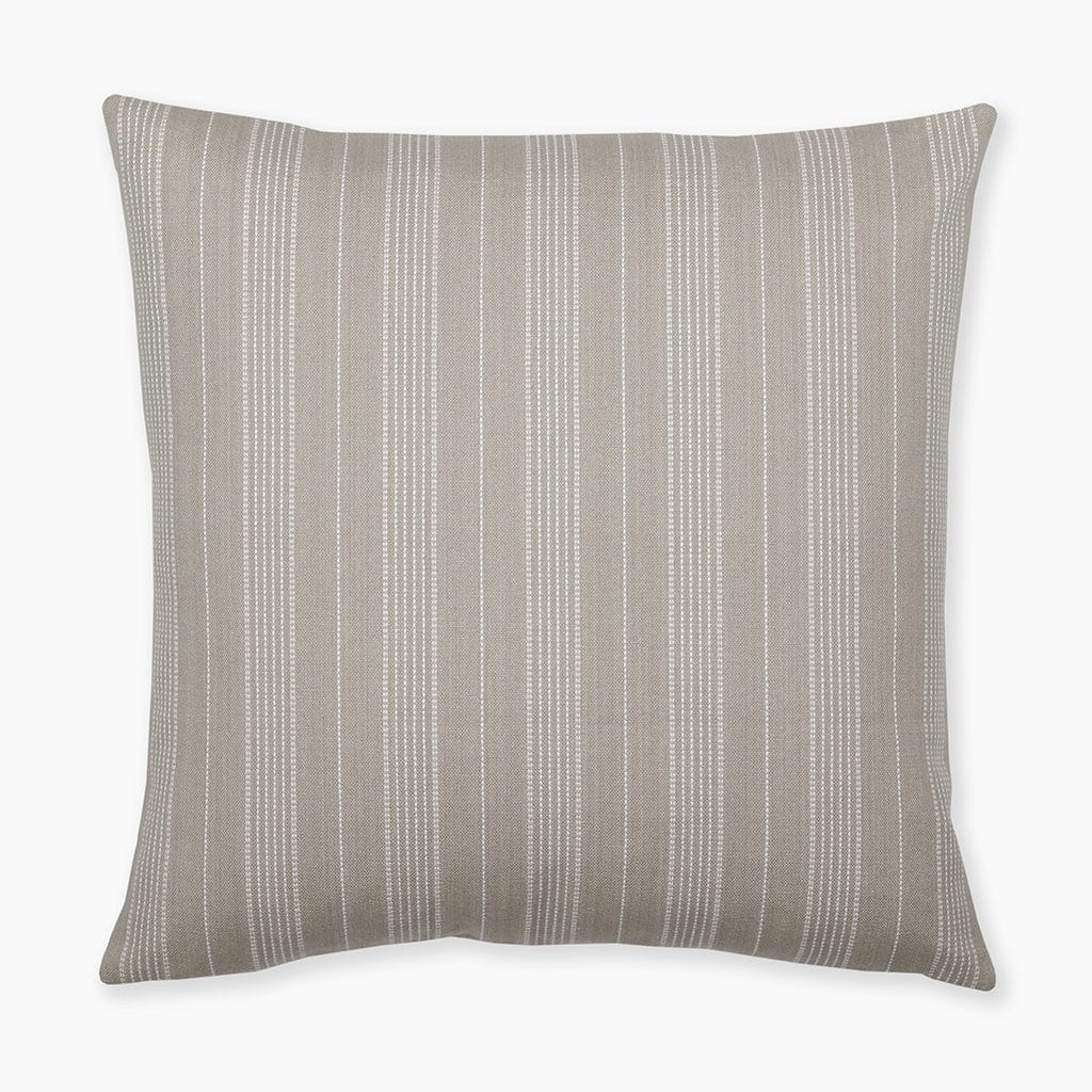 Flat lay of the Dayson pillow cover featuring grayish olive and cream vertical stripes on a white background from Colin and Finn.
