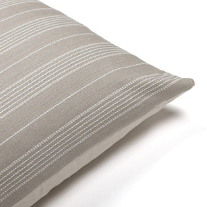 Close-up of the upper corner detailing of the Dayson pillow cover, highlighting its subtle yet stylish grayish olive and cream stripes from Colin and Finn.