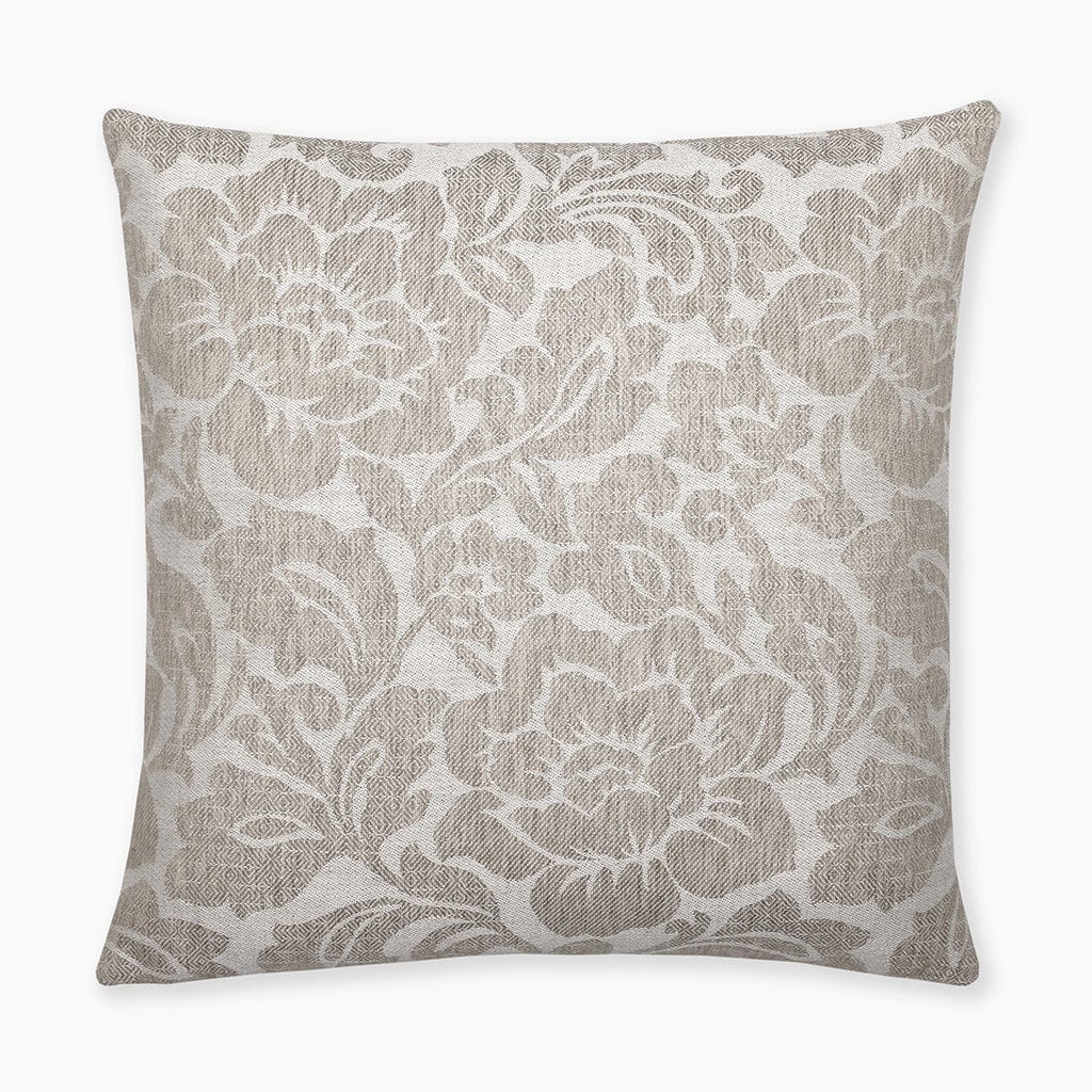 Flat lay of the luxurious Delsi pillow cover featuring a large-print floral pattern in cream and taupe tones from Colin and Finn.