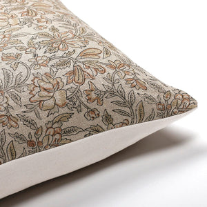Upper corner of Elain pillow cover from Colin and Finn showing the rustic floral print and the solid ivory backing.