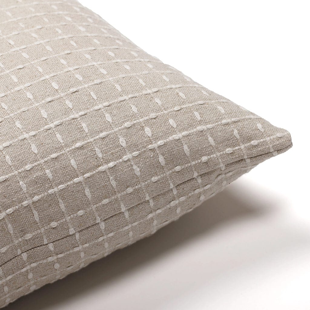 Upper corner of the Esme pillow cover set on a white background.