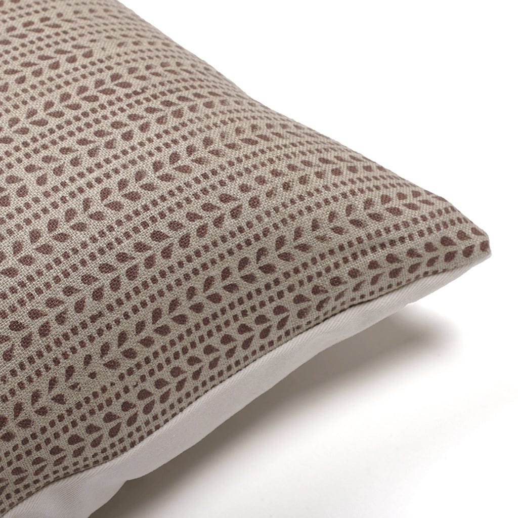 Get up close and personal with the intricate details of the Ester Pillow Cover from Colin and Finn. Admire the craftsmanship of Indian block printing. [Zoomed-in upper corner image of the pillow cover]