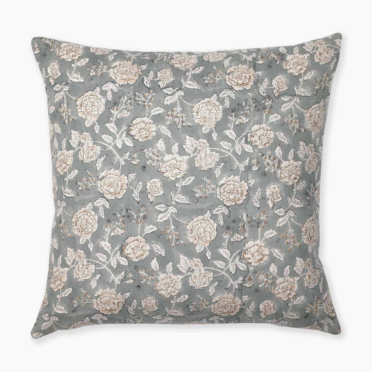 A square pillow with a light blue-green background features an intricate pattern of white and beige roses with green leaves and small brown branches. The floral design is spread evenly across the entire surface of the pillow.