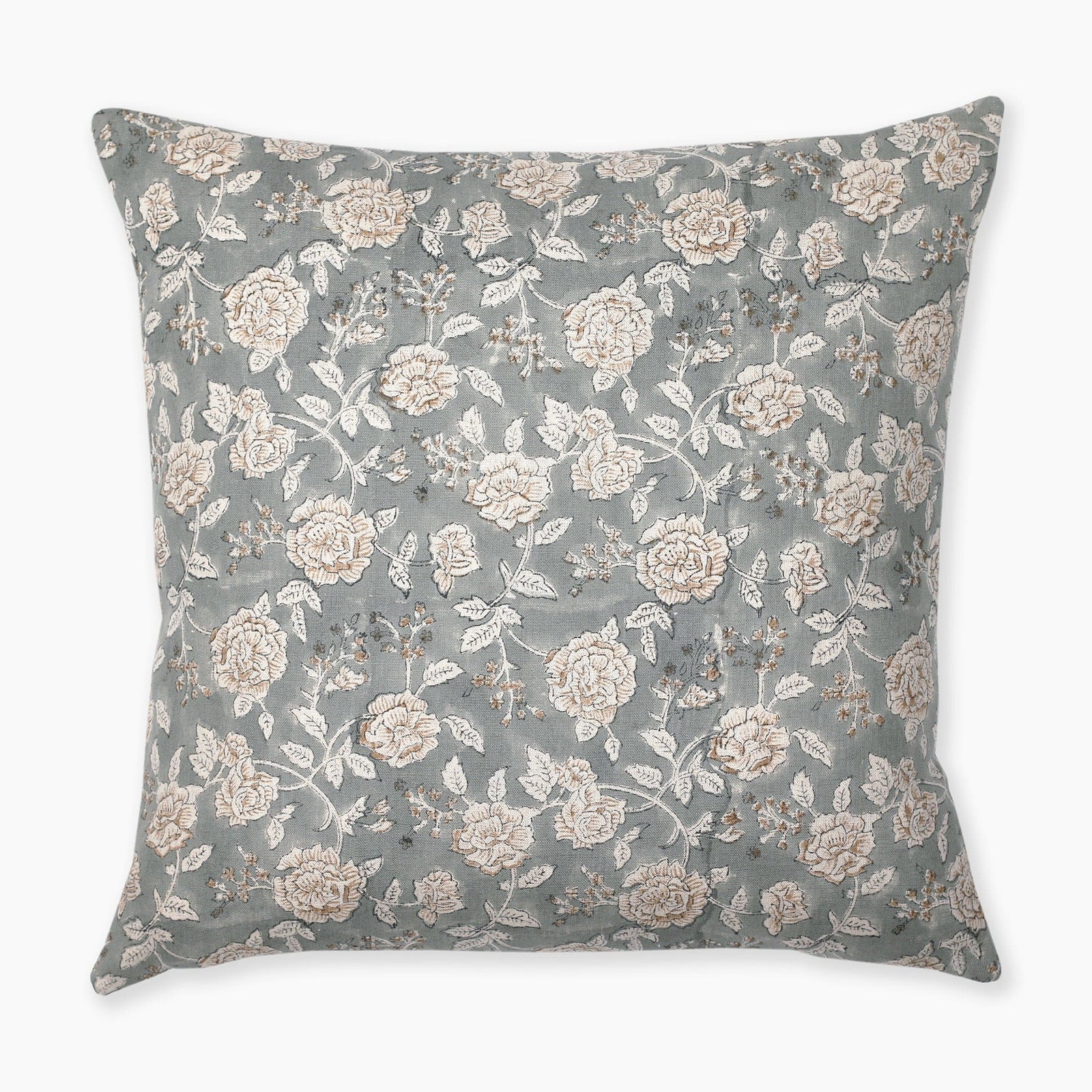 A square pillow with a light blue-green background features an intricate pattern of white and beige roses with green leaves and small brown branches. The floral design is spread evenly across the entire surface of the pillow.