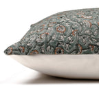 Side view of the Lydia pillow cover showing the floral front and the solid ivory backing.