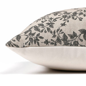 Side view of Magnolia pillow cover from Colin and Finn showing ivory solid backing and taupe and charcoal floral front.