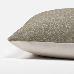 Side view of the Matilda Olive Lumbar Pillow Cover showing the floral front and solid back with an invisible zipper.