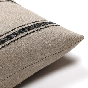 Upper corner of Maverick pillow cover fro Colin and Finn showing taupe linen textile on the front and back.