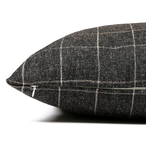 Side view of Mavis pillow cover showing same black plaid fabric on the front and back.