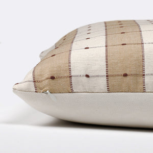 Side view of the Prescott lumbar pillow cover from Colin and Finn showing the invisible zipper and patterned front with solid, ivory back.