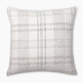 A square pillow cover with a neutral-toned plaid pattern featuring shades of white, beige, and light gray. The texture appears soft and slightly woven, suitable for decor in a living room or bedroom. The background is plain white.