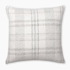 A square pillow cover with a neutral-toned plaid pattern featuring shades of white, beige, and light gray. The texture appears soft and slightly woven, suitable for decor in a living room or bedroom. The background is plain white.