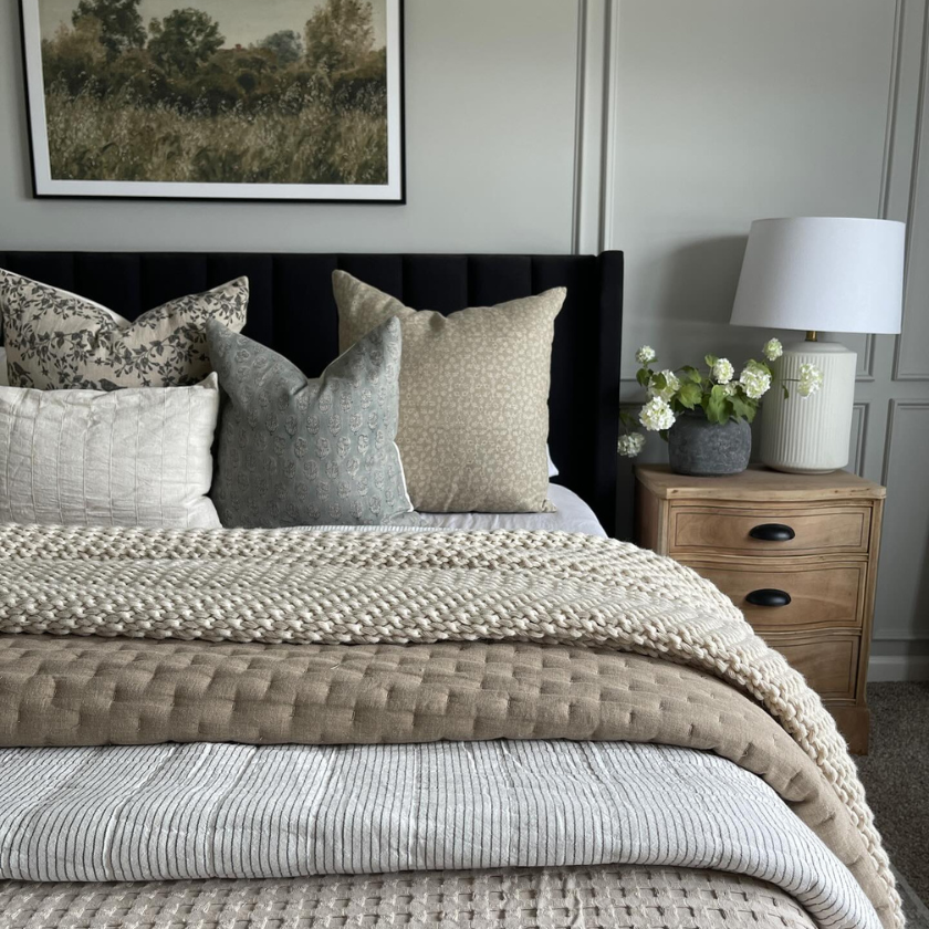 Colin and Finn throw pillow covers on @loganmmaggio cream and black bedding.