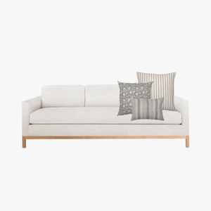 White sofa mockup with Colin and Finn's Alice Pillow Combination.