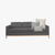 Dark gray sofa mockup of Ava pillow combination.