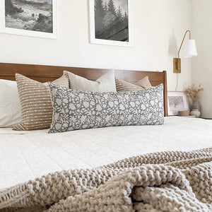 Bardot burlap, Laney, and Sawyer oversized lumbar pillow cover on cream couch with taupe blanket from Colin and Finn.