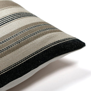 Corner of the Benedict lumbar pillow cover showing the woven linen and jute stripes