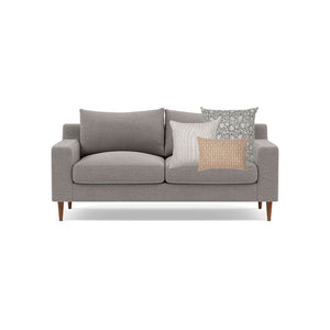 Conyer pillow cover from Colin and Finn including Sawyer, Laney, and Bardot Burlap Lumbar on a gray loveseat
