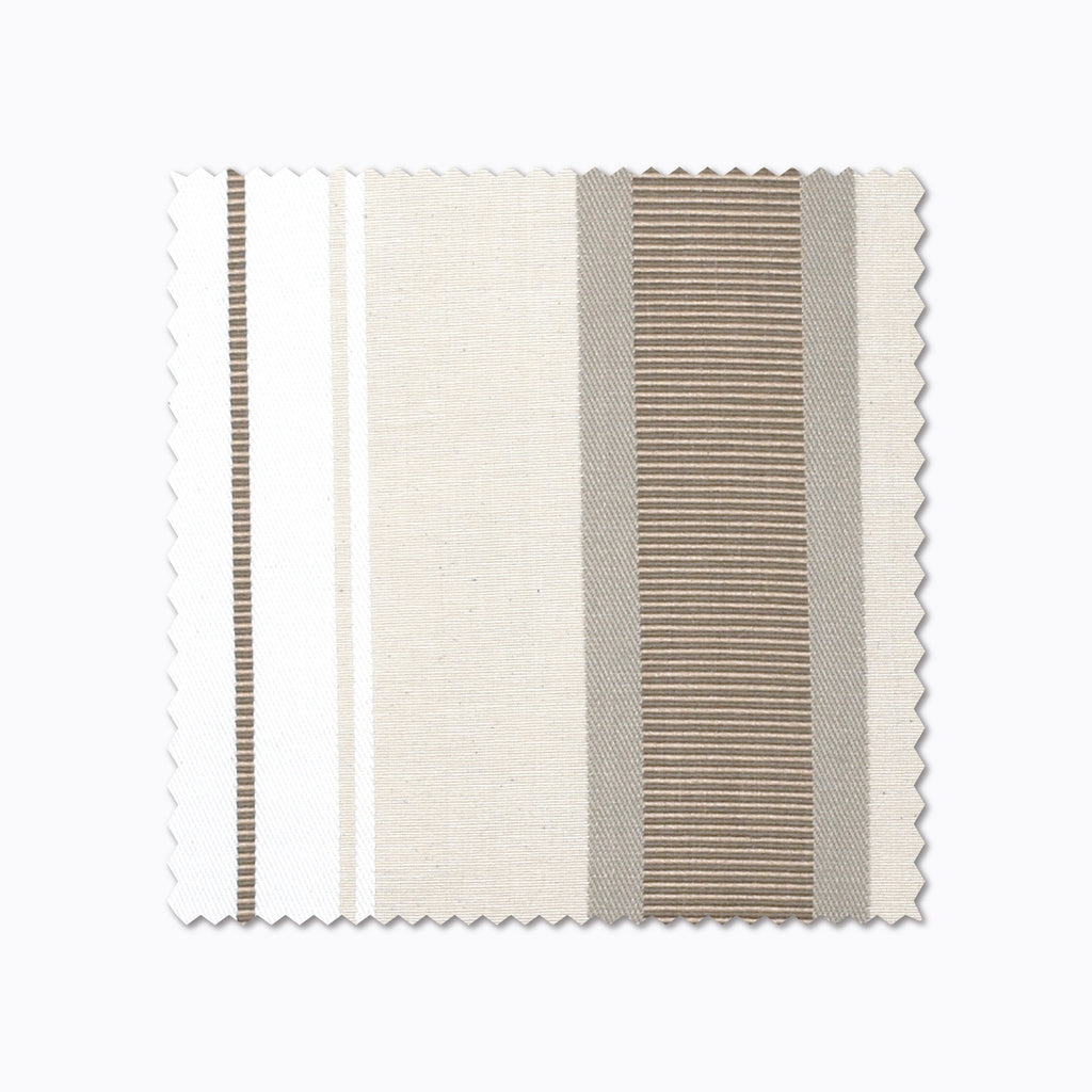 Charles fabric swatch from Colin and Finn. White, Cream, and Tan stripes