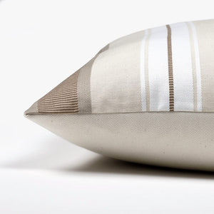 Side of the Charles pillow cover showing the stripe detailing and the ivory backing.