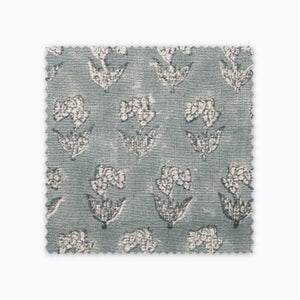 Eloise swatch showing blue gray linen and floral pattern.