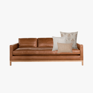 Leather sofa with Felicity pillow combination.