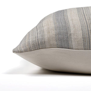 Side of the Felicity pillow cover showing the gray handwoven stripe detail and the ivory backing