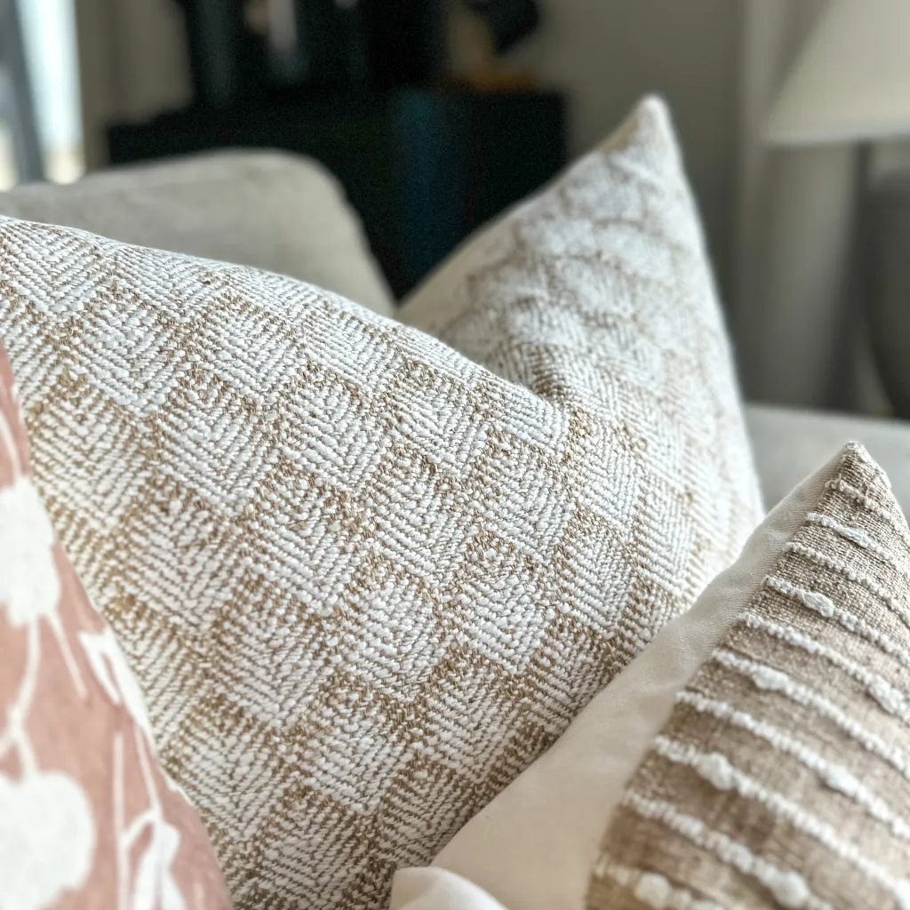 Close up of Jade pillow cover from Colin and Finn showing chunky floral detailing.