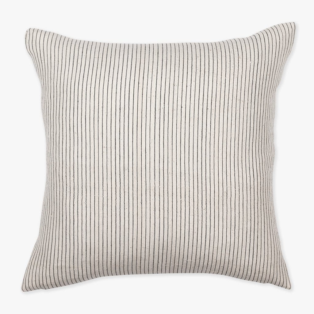 Laney pillow cover from Colin and Finn that's ivory with soft charcoal vertical stripes.