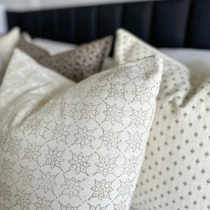 Closeup detail shot of Livvy pillow cover showing taupe floral block printed details.
