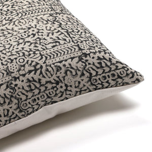Upper corner of Madison Lumbar pillow covers from Colin and Finn showing block print textile on the front and ivory backing. 