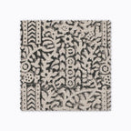 Madison fabric swatch from Colin and Finn. A black hand-block textile on natural linen