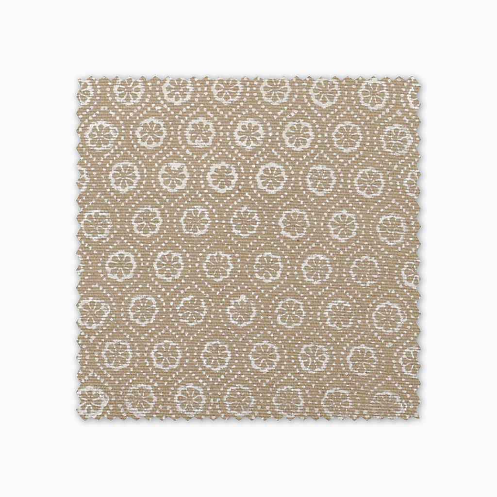 Matilda fabric swatch from Colin and Finn. Cream flowers on a mustard background