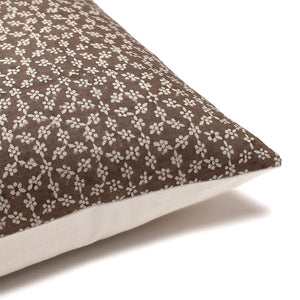 Corner view of Colin and Finn's Neville pillow cover in mocha color.