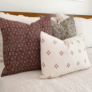 Closeup view of Forrest, Serena, and Dara lumbar pillow cover in the Rica pillow combination.
